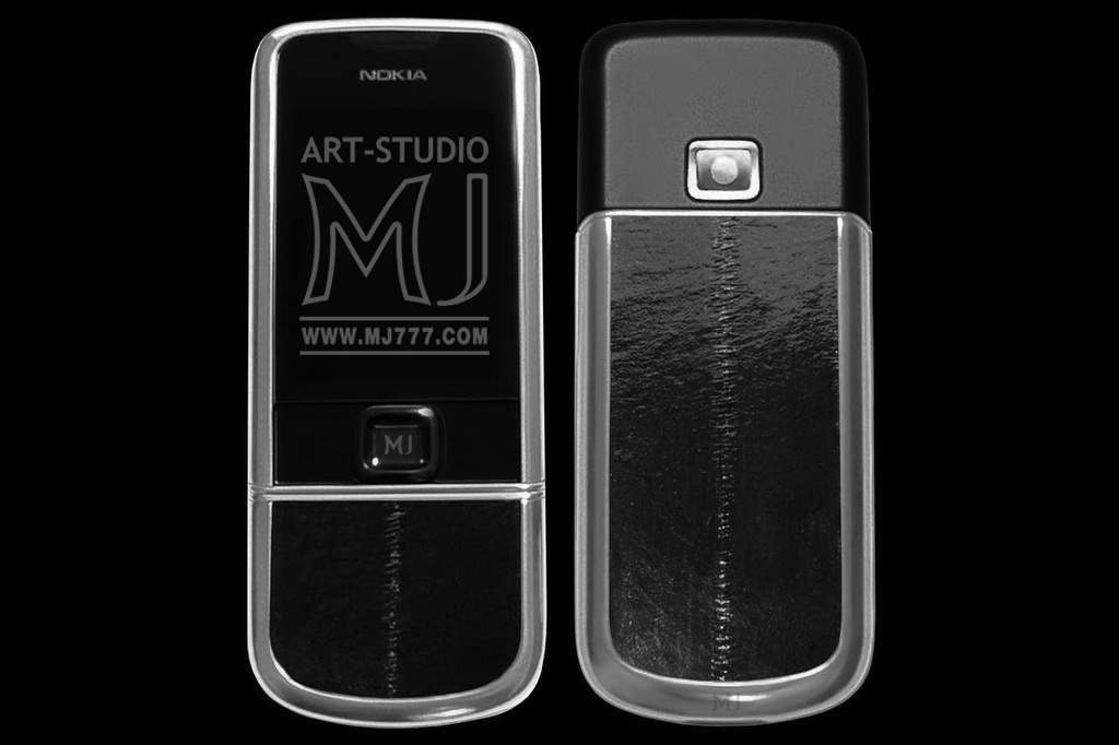 MJ - Nokia 8800 Arte Sapphire Platinum Black Eel Limited Edition - the shell of the platinum, buttons made of black wood, insert a skin of black sea eel. 